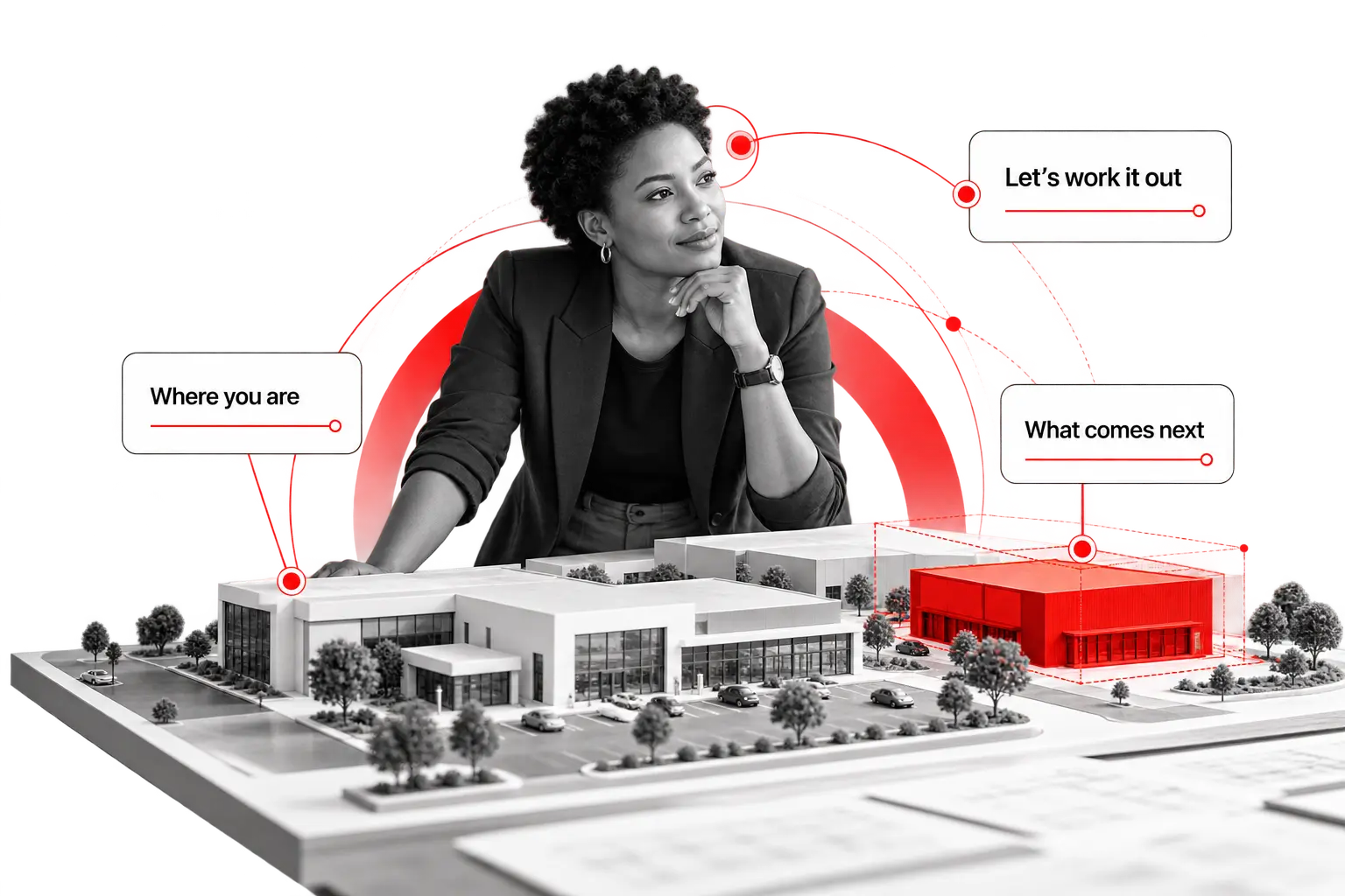 A business owner beside an architectural model with one red addition, planning the next move